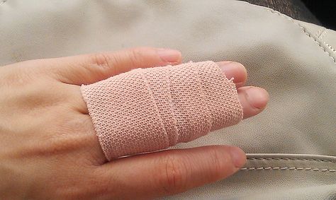 sprained finger buddy taping